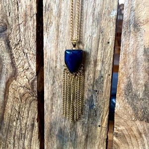 Gold tone vintage tassel necklace with blue stone